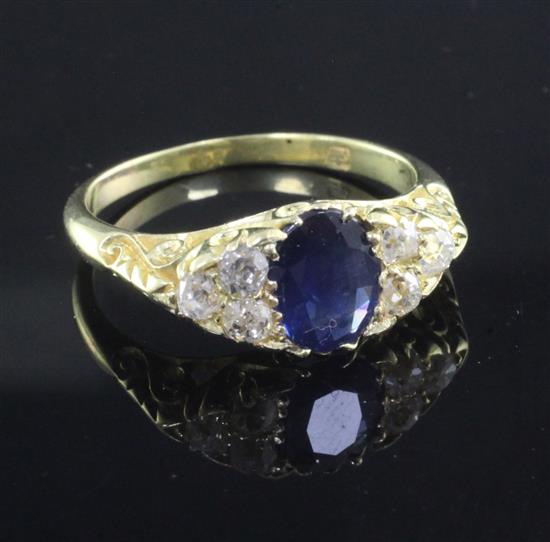 An 18ct gold, sapphire and diamond ring, size Q.